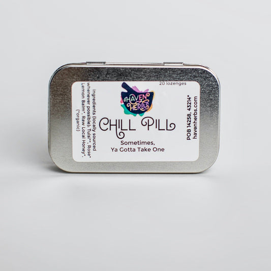 Hinged-lid tin labeled Chill Pill